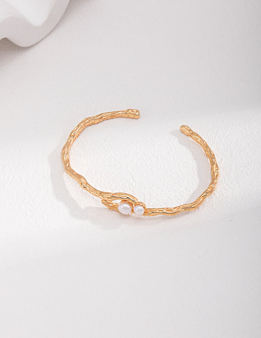 Bracciale con perle dorate